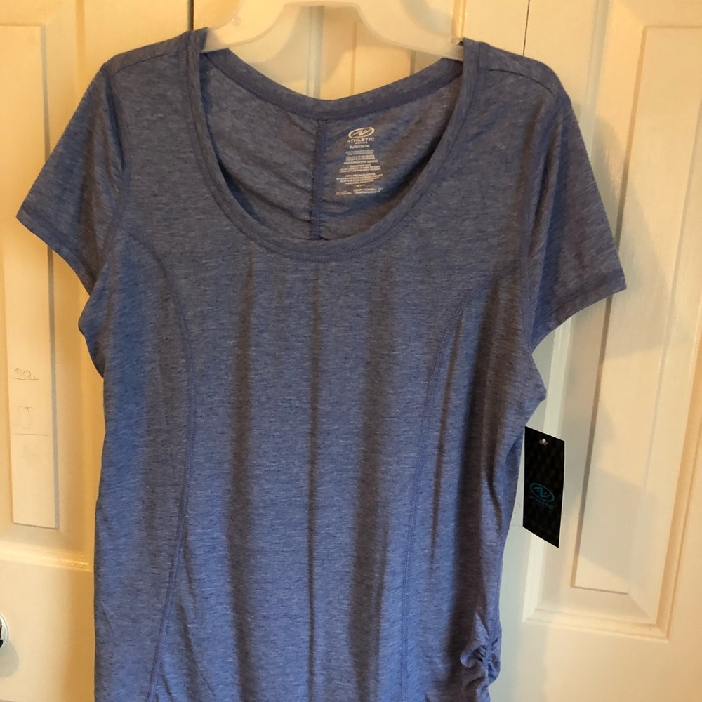 Athletic works moisture wicking top. High low hem.